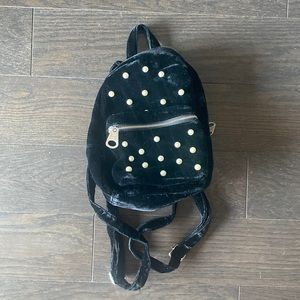 Studio 33 black velvet pearl backpack.